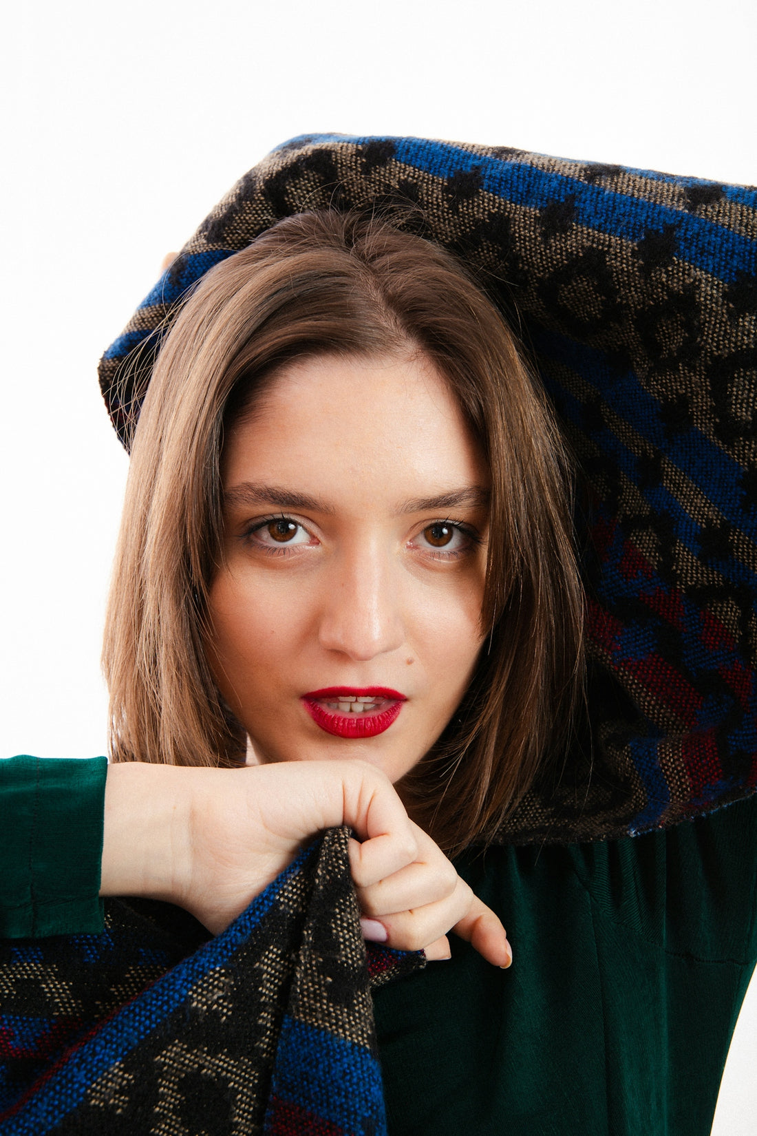 a woman with a scarf around her neck