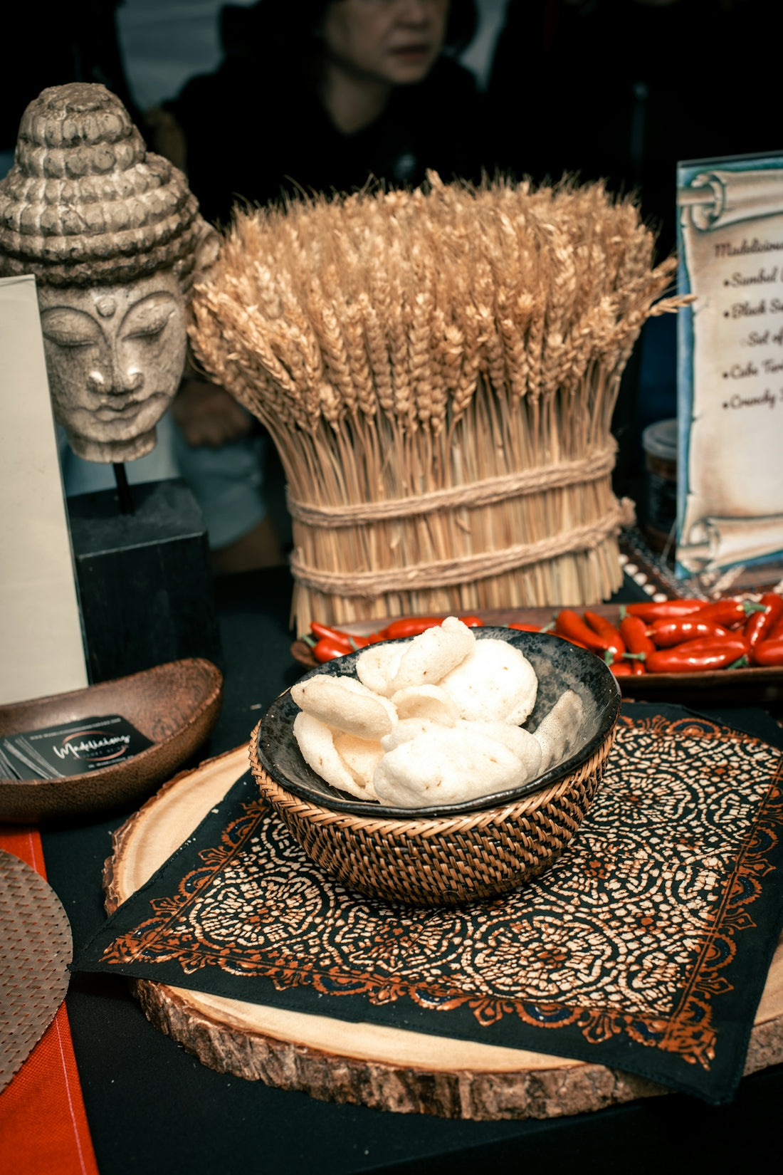 A table topped with a bowl of whipped cream